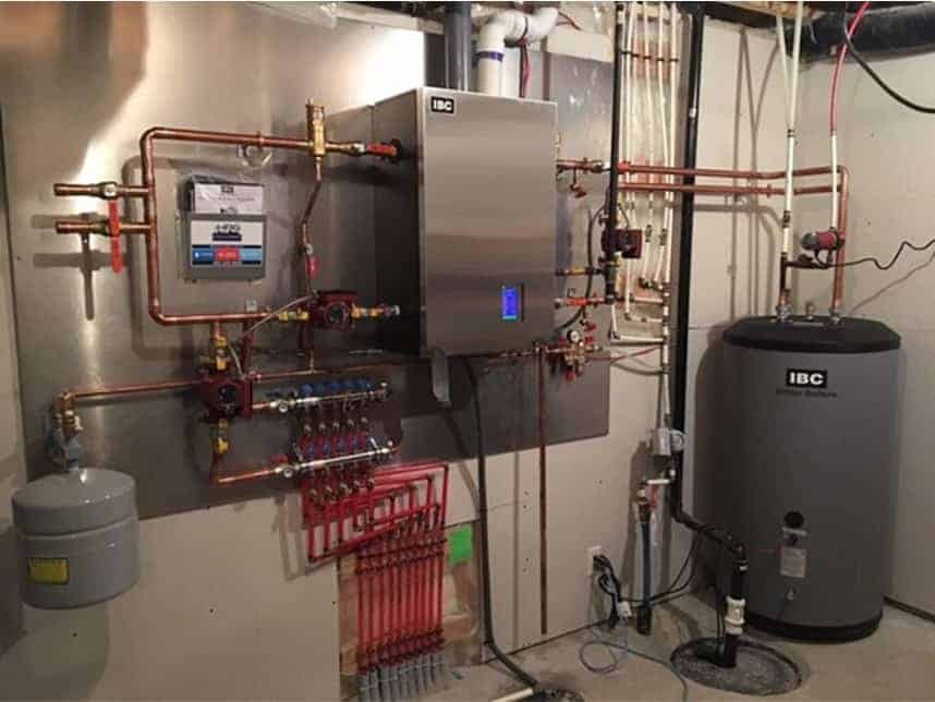 New multi-family boiler system in the mechanical room of an income property
